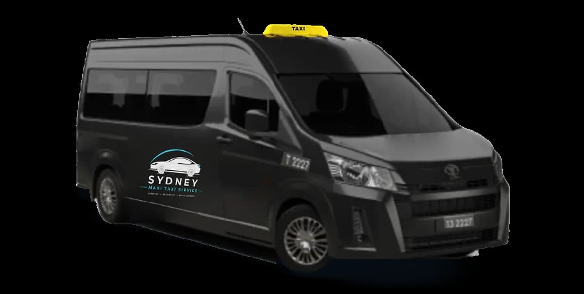 Black Toyota HiAce maxi taxi, front three-quarter view